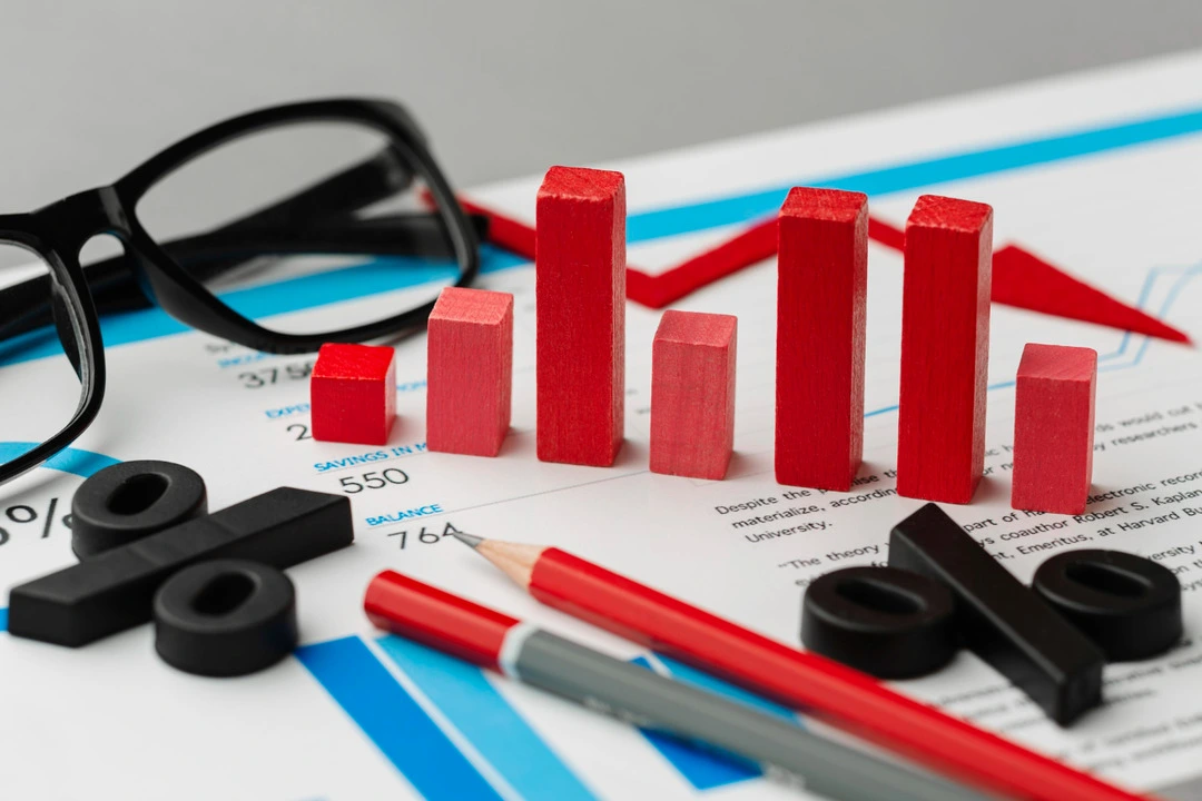 The Red bar graph blocks, percentage symbols, and data sheets illustrate smart pricing tactics.