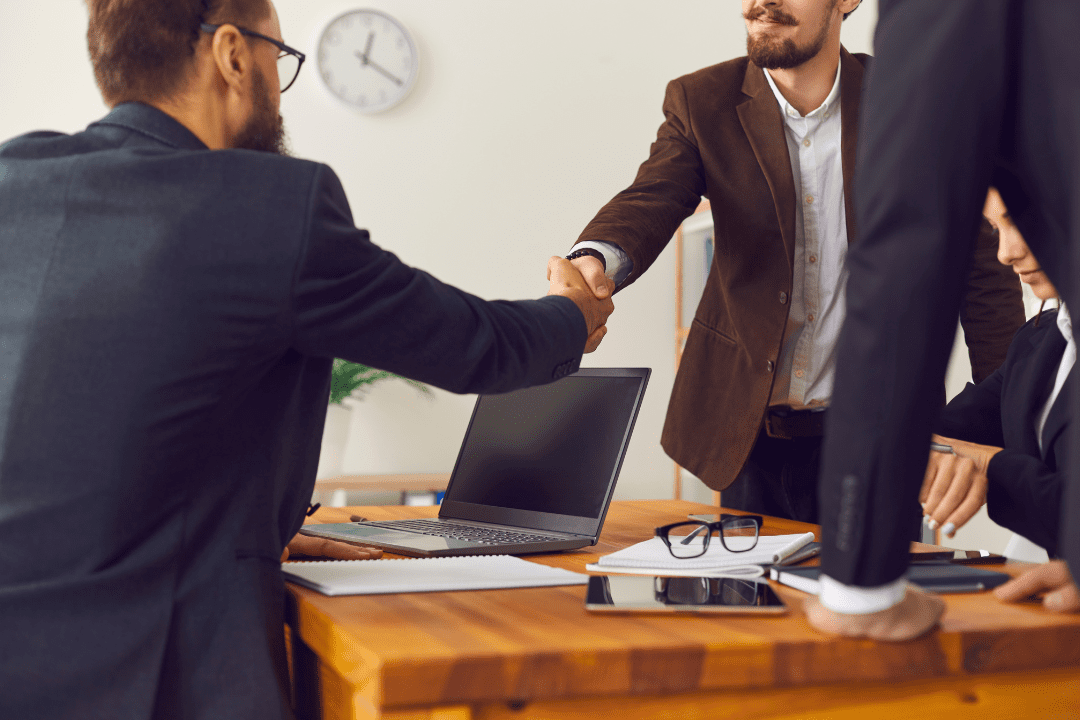 Two People shaking hands for an affiliate agreement between them