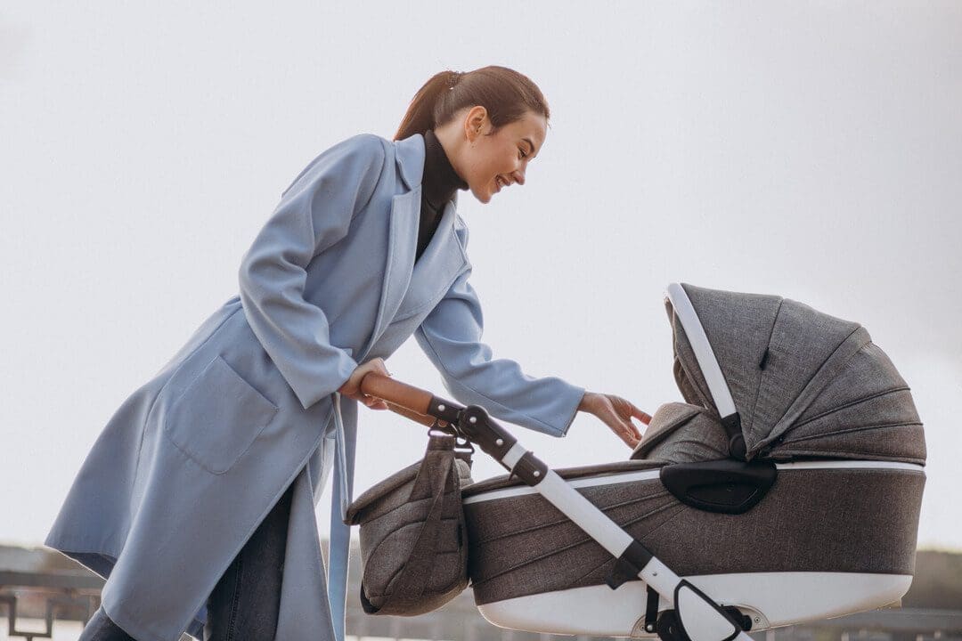 Modern baby stroller being adjusted for representing rental business ideas
