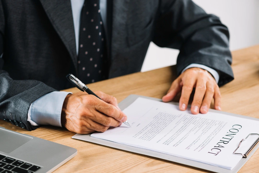 Filling out legal and insurance paperwork for starting a table and chair rental business.