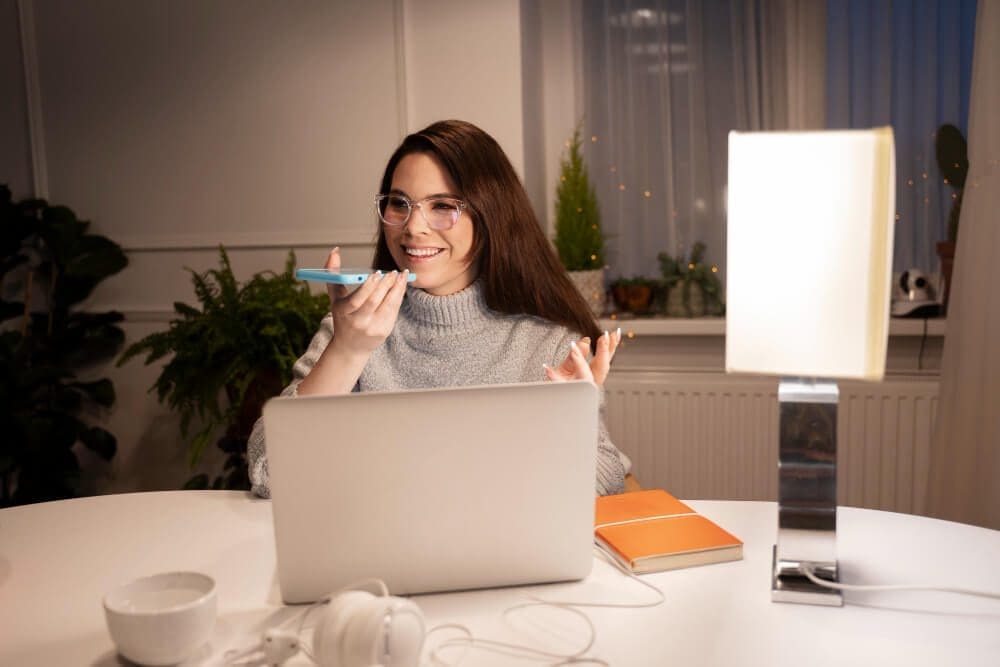 Home rental business side hustle setup with laptop and phone