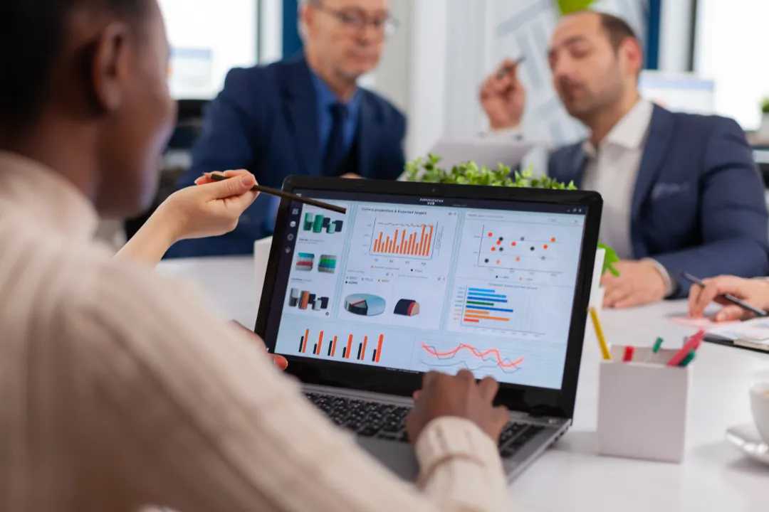 Business professionals reviewing market data to understand mailbox rental trends