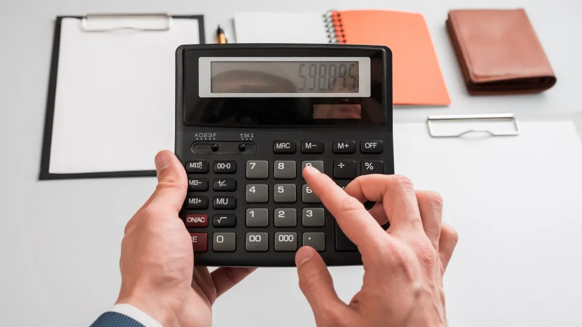 Calculating venue rental prices on a calculator for business profitability