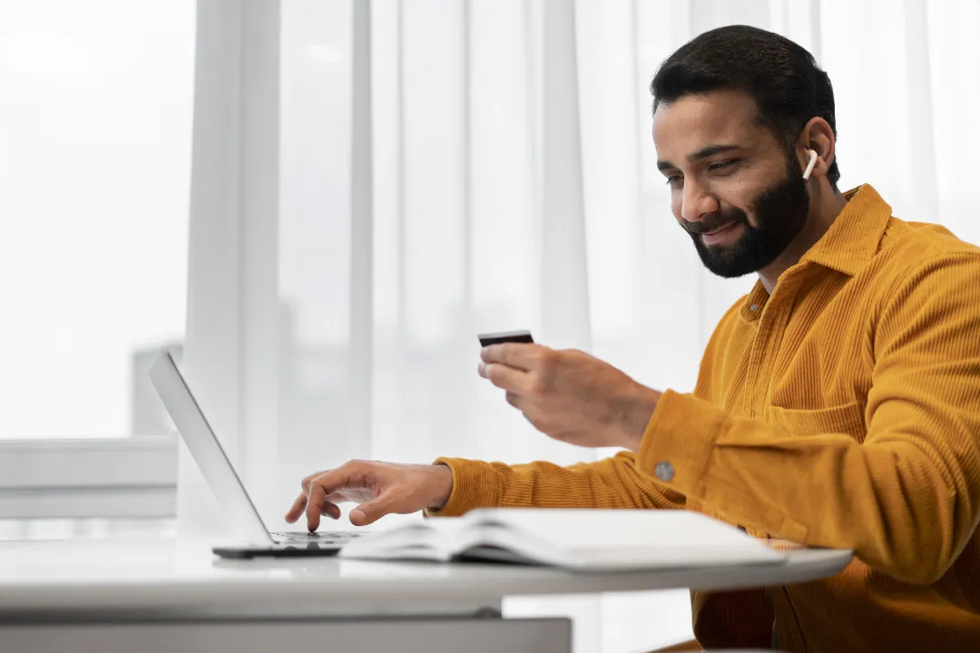Customer booking a rental service online with a credit card