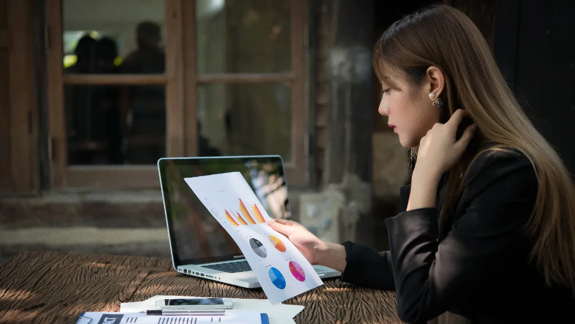 Entrepreneur analyzing market data for container rental niche selection