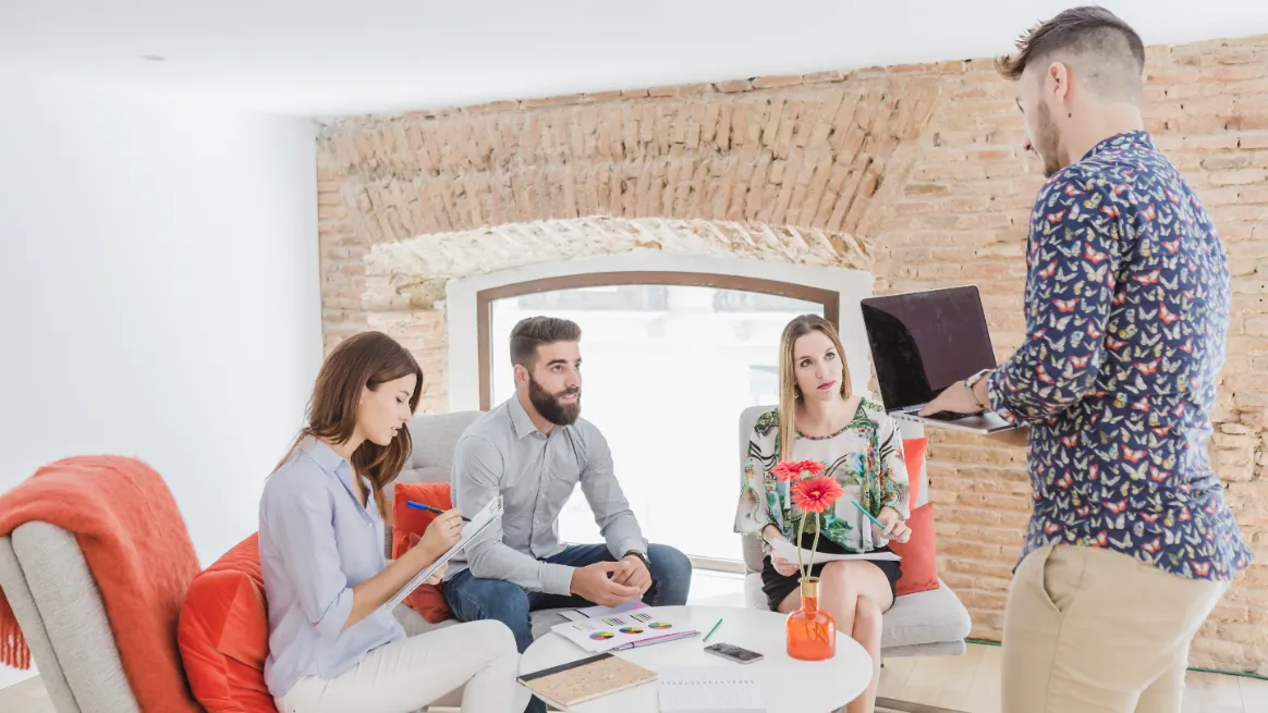 Group discussing marketing strategy for online business